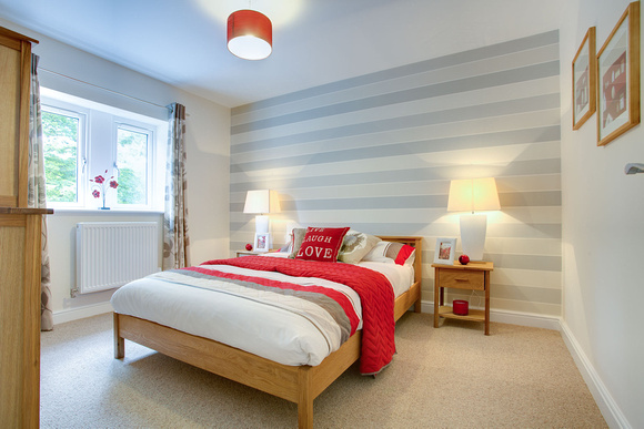 Showhome, bedroom, red and grey.