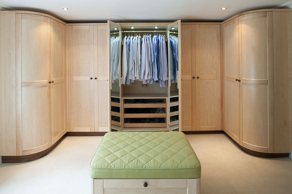 Bedroom with bespoke Maple finsihed, fitted wardrobes.